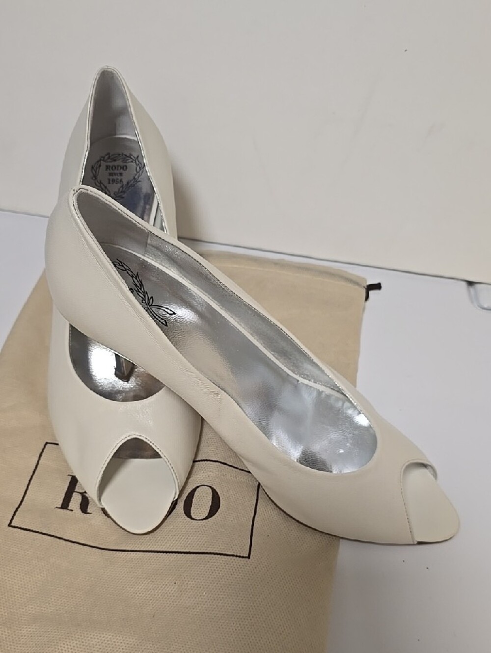 Rodo Women's Cream Open-Toe Pumps with Silver Lining and Heel.